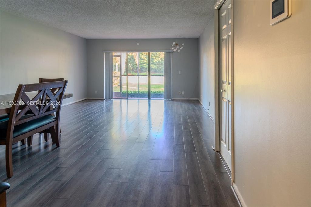 Photo of 16431 Blatt Blvd #103, Weston, FL 33326 (MLS # A11992903)