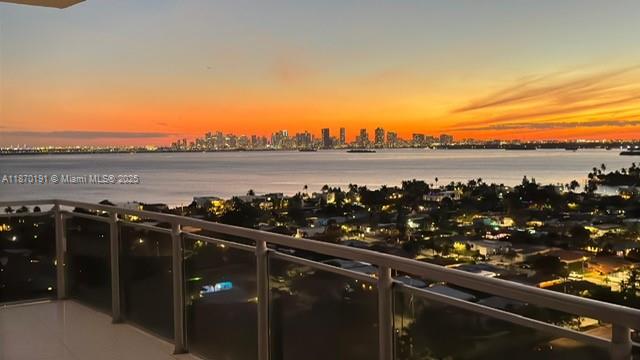 Step into a home where every day feels like a getaway. This renovated 2BD+Den,3BA corner residence spans nearly approx. 1750 SF with soaring 10.ft ceilings and a 600 SF wraparound balcony framing dazzling bay & skyline views. Light pours through impact glass doors onto sleek white porcelain floors,while smart-home features,motorized shades,a chic Italian kitchen with new appliances create effortless living. The primary suite offers a spa-like bath with jetted tub, glass shower & picture window overlooking downtown. Den is converted to a 3rd bedroom with its own full bath. The Lexi delivers resort-style amenities: infinity pool, modern gym & 24 hr. security. Ready to move in and start your waterfront lifestyle!
