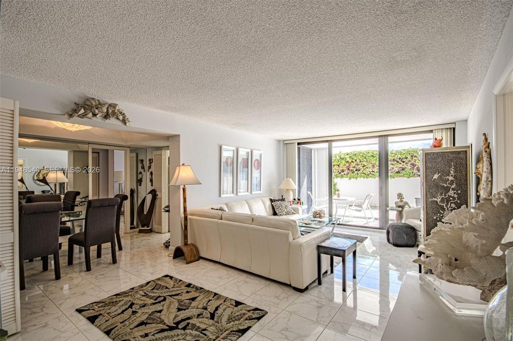 Photo of 3590 S Ocean Blvd #102, South Palm Beach, FL 33480 (MLS # A11948540)