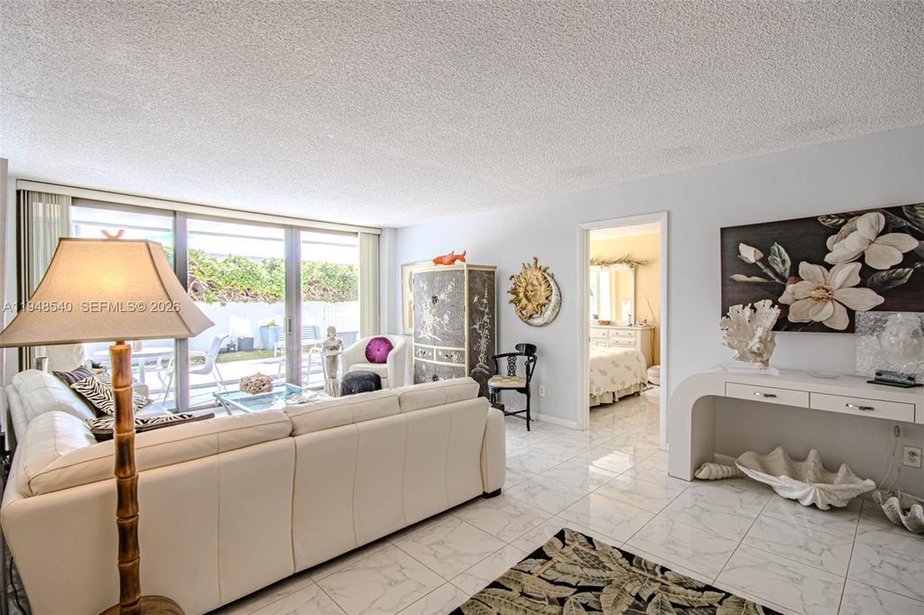 Photo of 3590 S Ocean Blvd #102, South Palm Beach, FL 33480 (MLS # A11948540)