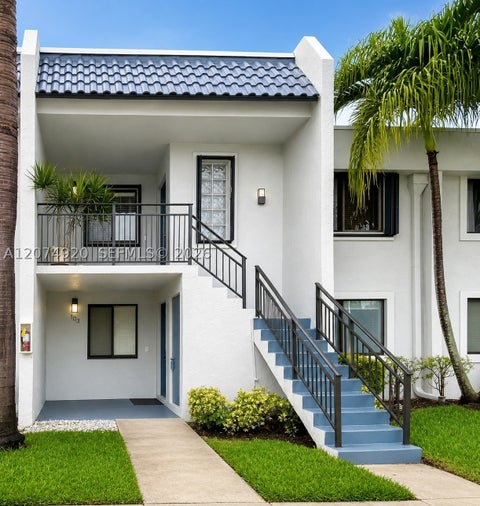 Photo of 16511 Blatt Blvd #103, Weston, FL 33326 (MLS # A12074920)