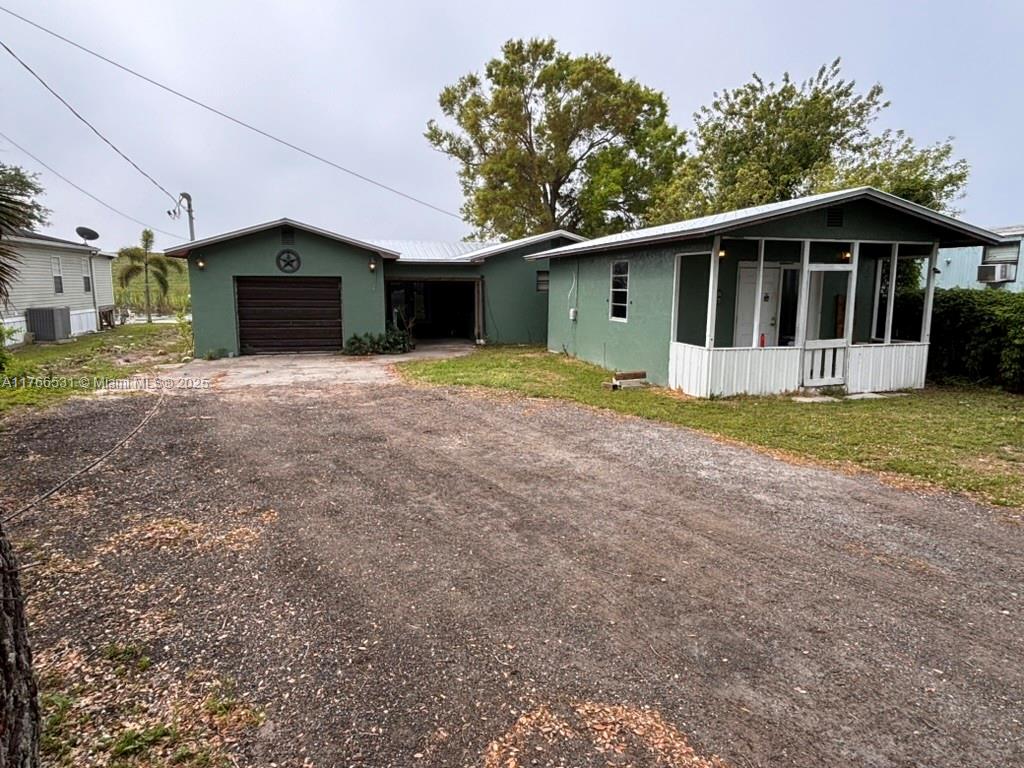PRICE REDUCED! Move-in Ready Multi-Family Rental or Home with Office/Mother-in-Law Suite on the Rim Canal!
This waterfront property offers flexibility as a multi-family rental, private residence with a guest house, or home with an office/mother-in-law suite. Located on the Rim Canal, just minutes from Lake Okeechobee access.
Two structures + RV hookups (electric, water, sewer, separate FPL meter). 4-bed, 2-bath CBS home. Efficiency cottage- with kitchen & full bath. 4 separate FPL meters- for independent utilities.New Roof (2024), Water Heater (2025), Water Purifier (2024), 4-Ton AC (2020)
Dock & seawall permit has been issueD (transferable, 18 months in, covered boat house planned)
Great investment! Owner financing available for full price offer.