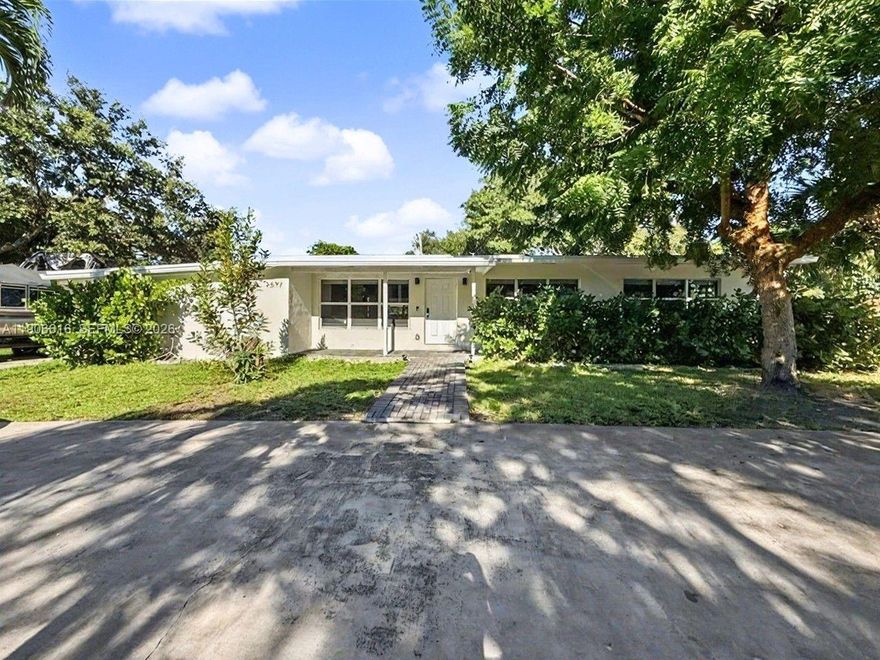 Welcome to your private tropical retreat in the heart of rapidly growing Dania Beach! This beautifully updated 4-bedroom, 3-bath home sits on an oversized 16,140 sq ft lot, offering exceptional space, privacy, and endless possibilities. Step outside to your own resort-style oasis featuring a sparkling pool, relaxing hot tub, and outdoor shower—all perfect for lounging, entertaining, or embracing the South Florida lifestyle. A full guest house with its own private entrance provides incredible flexibility for rental income, extended family, or a comfortable work-from-home setup. Inside the main home, you’ll enjoy a modern kitchen, stylishly updated bathrooms, and impact windows & doors throughout for peace of mind. Situated in one of South Florida’s fastest-growing communities and just minutes from the beach, top shopping, dining, and major highways—this is the ideal blend of comfort, convenience, and opportunity. Your dream home awaits!