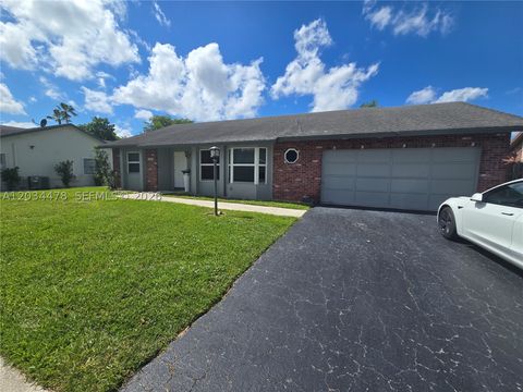 Photo of 7921 NW 4th St, Plantation, FL 33324 (MLS # A12034478)