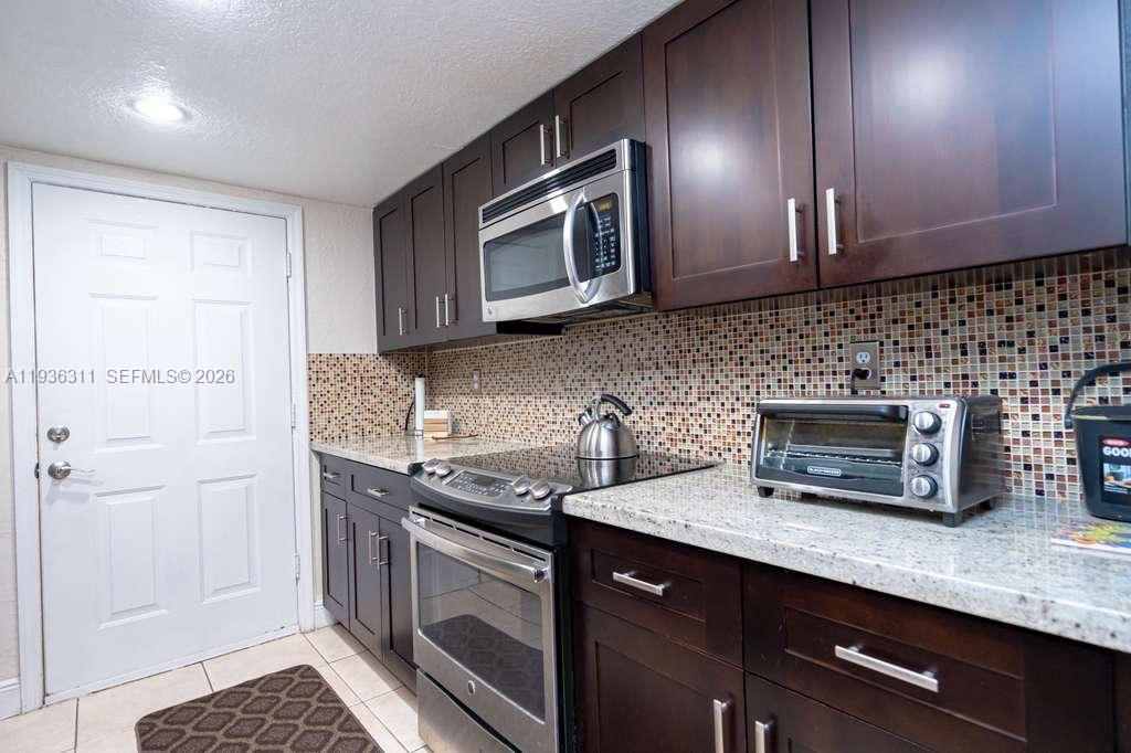 COURTYARDS AT KENDALL CON - Residential