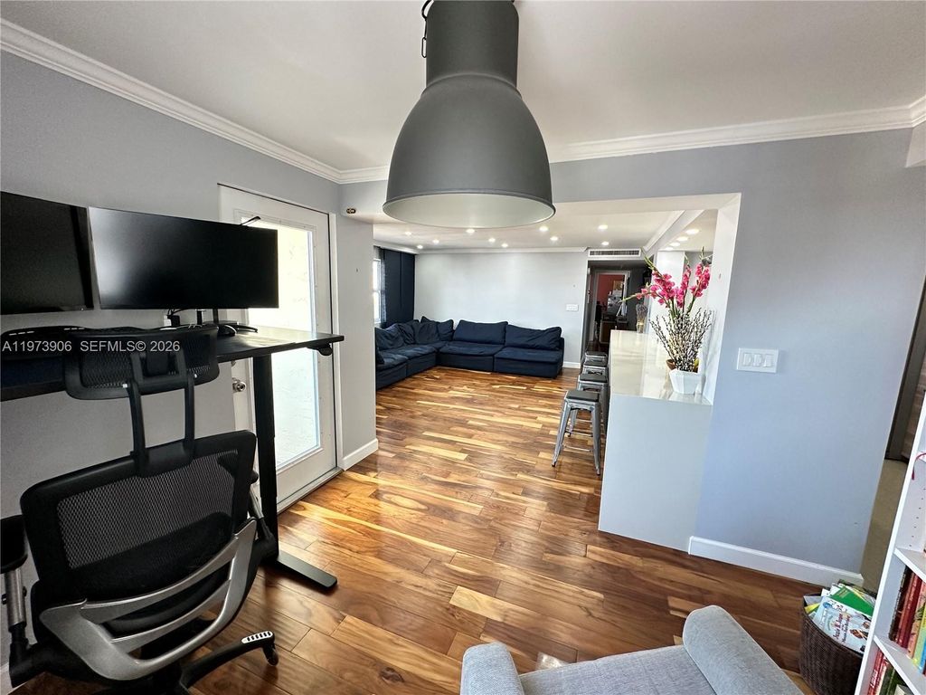 Photo of 401 Golden Isles Dr #1013, Hallandale Beach, FL 33009 (MLS # A11973906)