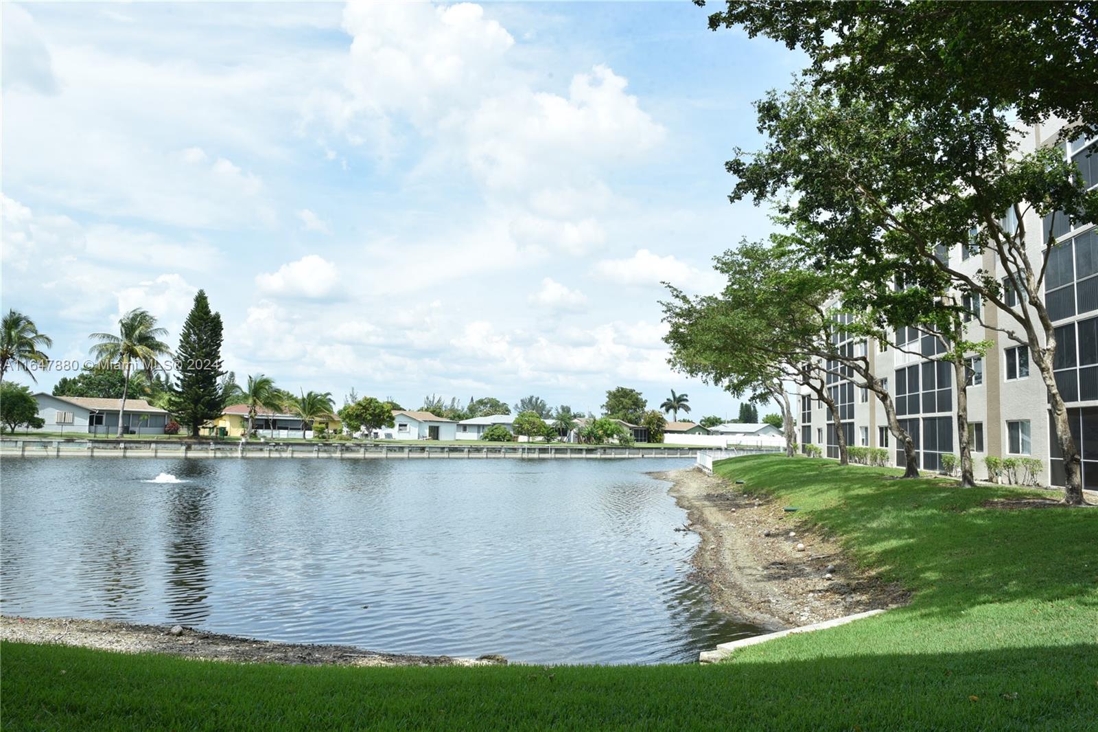 WONDERFUL WELDON @ KINGS POINT. Gorgeous Corner Lake Front Property. Spacious First Floor Unit in Highly Desirable Senior Community with Gated Private Front Entrance. 2 BR/ 2 BTH /1,450SF Condo.
Two large bedrooms with bathrooms and large walk-in closets. Laundry room with Washer/Dryer. Screened-In Porch Front and Back. Patio has tranquil Waterfront Views. Community Amenities including State-of-the-Art Performing Arts Theater, Courtesy Shuttle, Indoor& Outdoor Pools, Fitness Center, Clubhouse, Pickle Ball, Tennis Courts and Billiard Room. Cable included and condo approval required, and it takes approx. 30 Days- Minimum credit score 700
