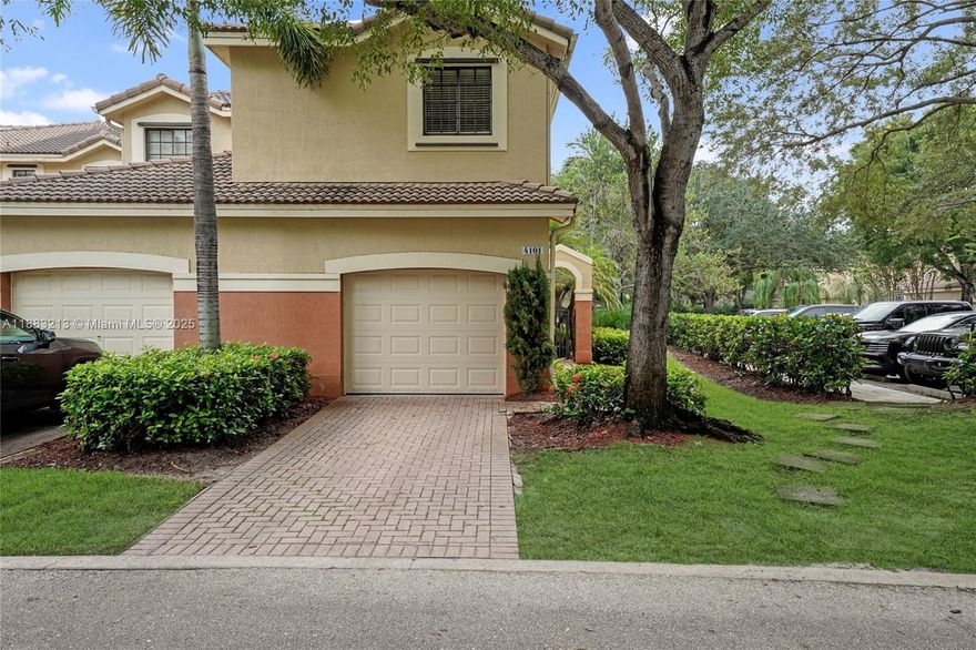 Beautiful corner unit townhouse available for rent in the gated community of Courtyard at the Grove. This spacious 4-bedroom, 2.5-bathroom home features a private courtyard entrance, screened patio, a one-car garage, and a paved driveway. Inside, you'll find tile flooring on the first floor and laminate on the second. All four bedrooms are located upstairs for added privacy. Screened-in patio that opens directly to the community pool and playground—perfect for families. Surrounded by A-1 rated schools and Weston library and Weston Public Library, this home offers unmatched convenience and a family-friendly environment. Ample guest parking and a well-maintained community.