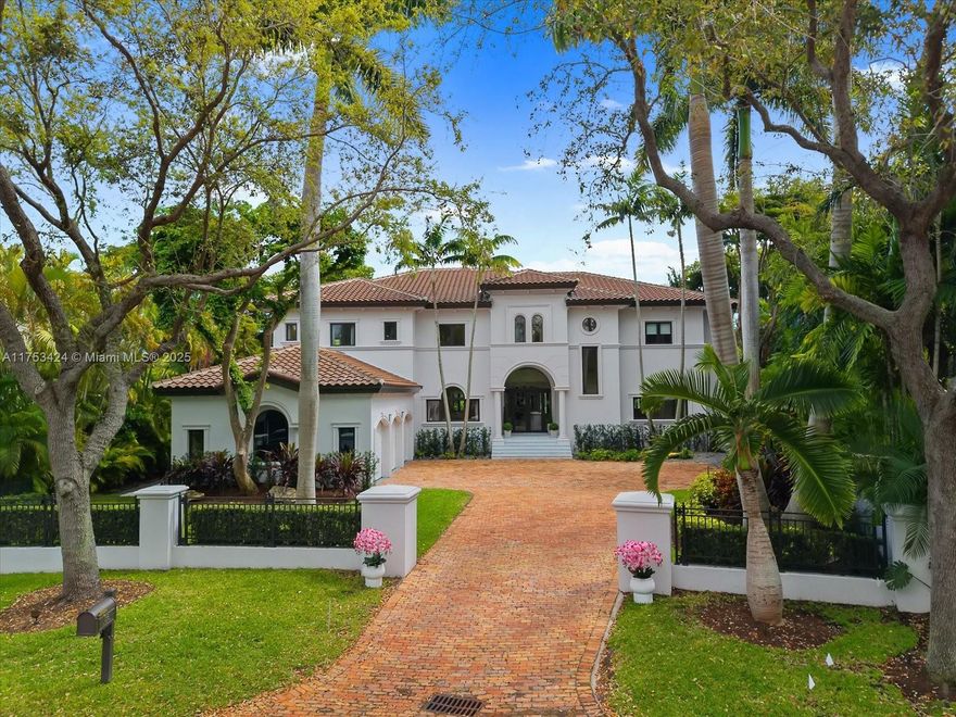 Welcome to 136 Paloma, a newly renovated modern Mediterranean estate in the exclusive Cocoplum neighborhood of Coral Gables. Situated on a 15,850 SF lot with 169 feet of water frontage, this two-story home spans 7,113 SF of refined living space. The grand entryway leads to soaring ceilings, expansive living areas, and floor-to-ceiling impact windows. With six bedrooms, an office, and 7.5 bathrooms, it features a chef’s kitchen with state-of-the-art appliances and a luxurious primary suite. The backyard oasis boasts a refinished pool, grey marble patio, and a private 49-foot dock with direct water access. Available furnished by IMG, this is a rare opportunity for waterfront luxury.