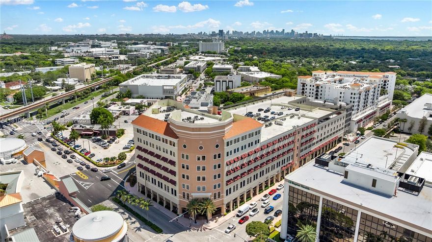Exceptional opportunity to own a medical office suite in Coral Gables, steps from Downtown South Miami, the Metrorail Station, and US-1. Located on the 5th floor, this corner unit offers rare convenience—patients and visitors can park on the same level of the covered garage and walk directly into the suite via a private office exit to the garage.

The office features 5 versatile rooms, currently configured as 2 exam rooms and 3 private offices, along with a spacious waiting room, large reception area for efficient patient check-in and check-out, a staff kitchenette, and a private restroom. Additionally, two assigned staff parking spaces are included on the 4th floor of the garage.
 Don’t miss out on this turnkey space perfect for a growing practice.