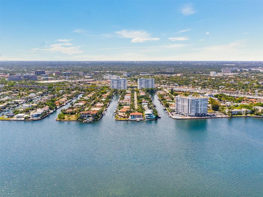 DIRECT BAY VIEWS from every room! Totally remodeled largest 2BR/2BA unit in the building with 1,304 SF plus balcony! Custom kitchen with granite countertops, stainless steel appliances, and porcelain tile floors throughout. Ample storage and generous closet space. Large primary suite with seating area. Impact windows and sliding doors. Newer A/C and water heater. Assigned garage parking.Bayview Towers amenities include a recently remodeled Olympic-size heated pool, new roof, saunas, gym, library, lounge room, and in-house management. 50 year recertification completed and financially stable building with reserves. Recently redesigned lobby! Maintenance includes high-speed internet, cable with premium channels, pest control, water, and sewer. Additional storage on the same floor. New state-of-the-art telecom entry system and additional visitor parking. Live in exclusive Sans Souci Estates. Walk to Whole Foods, restaurants, and shops. Minutes to Bal Harbour Shops and only 6 minutes to the beach. ***PRICED TO SELL !! Hurry!! ***