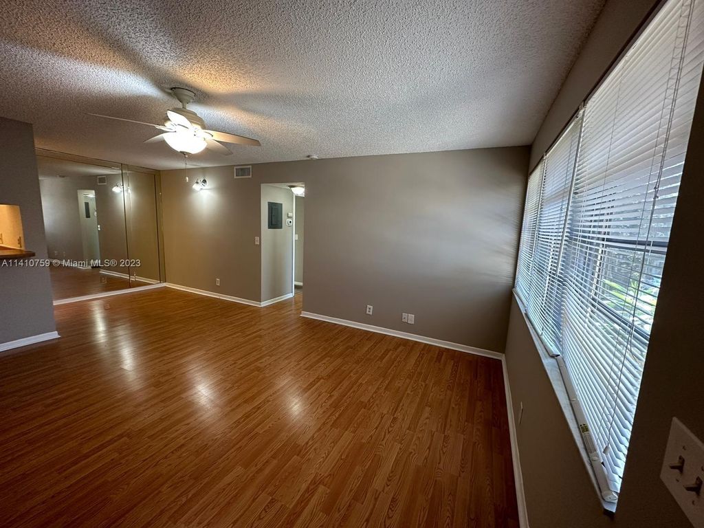 Photo of 1016 Twin Lakes Dr #20-G, Coral Springs, FL 33071 (MLS # A11410759)