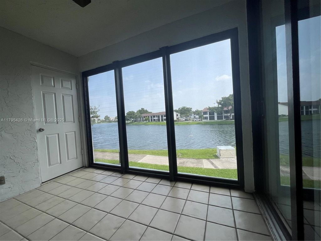 Photo of 203 Lake Pointe Dr #208, Oakland Park, FL 33309 (MLS # A11795426)