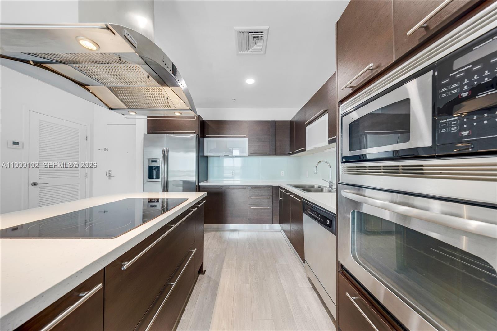 ELOQUENCE ON THE BAY COND - Residential Lease