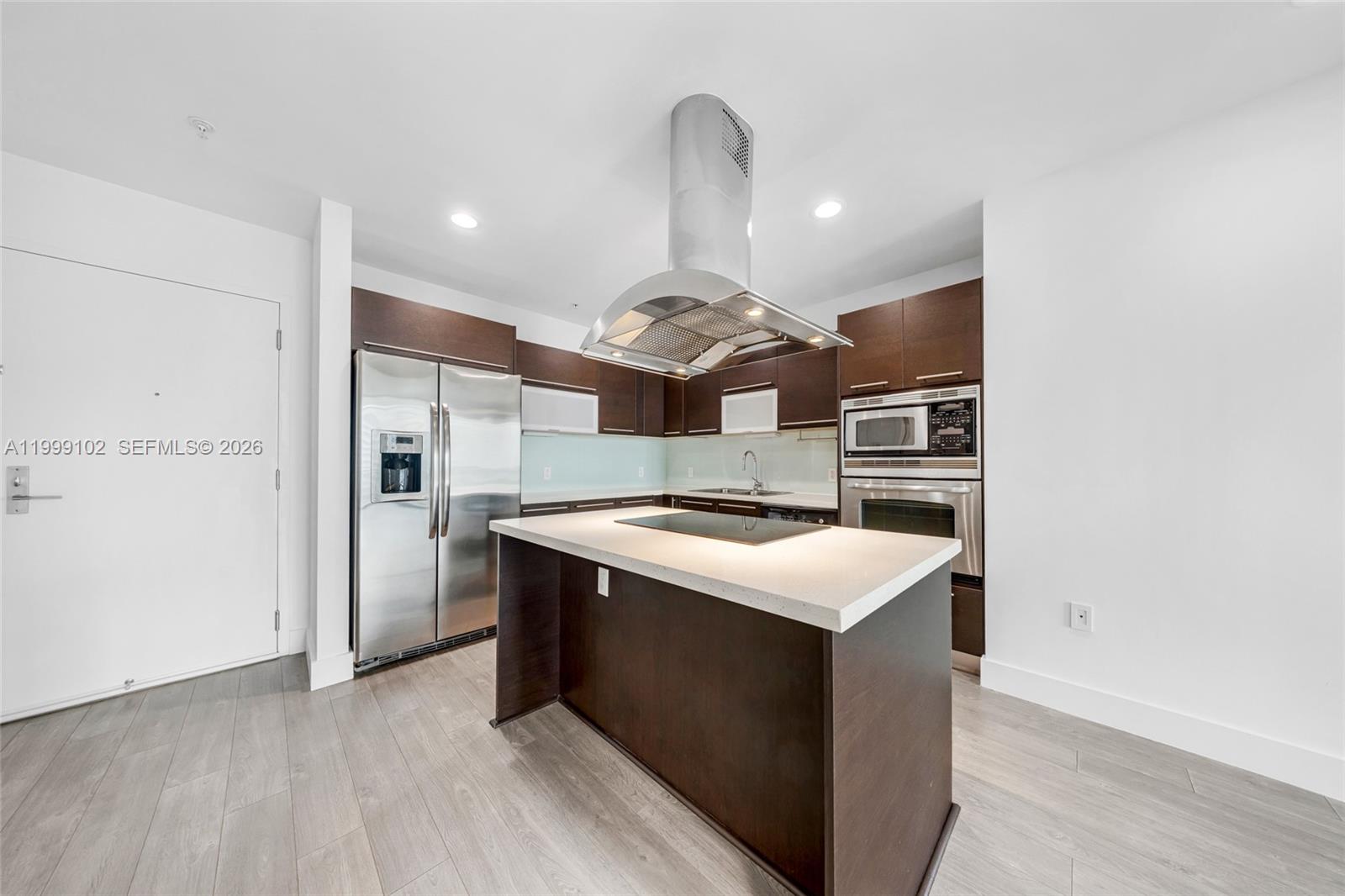 ELOQUENCE ON THE BAY COND - Residential Lease