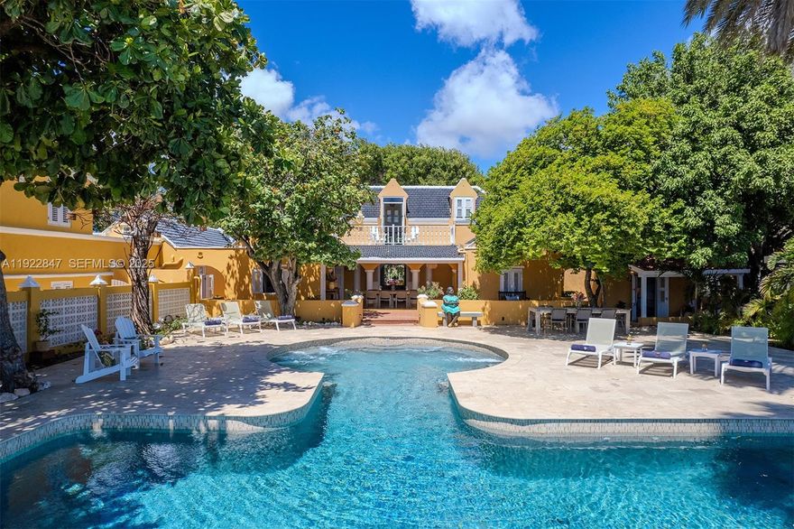 Penstraat 34, Downtown, oceanfront historical estate with beach, pool and privacy. Located on Penstraat in downtown pietermaai. Currently established as a private resort, the property grounds include tropical garden, pool, gazebos, and secluded beach.