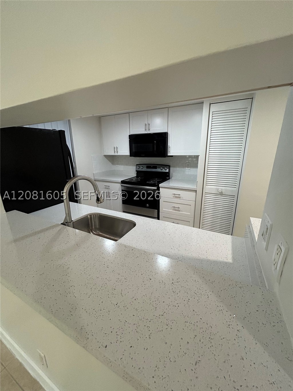 Photo of 9733 Westview Dr #1321, Coral Springs, FL 33076 (MLS # A12081605)