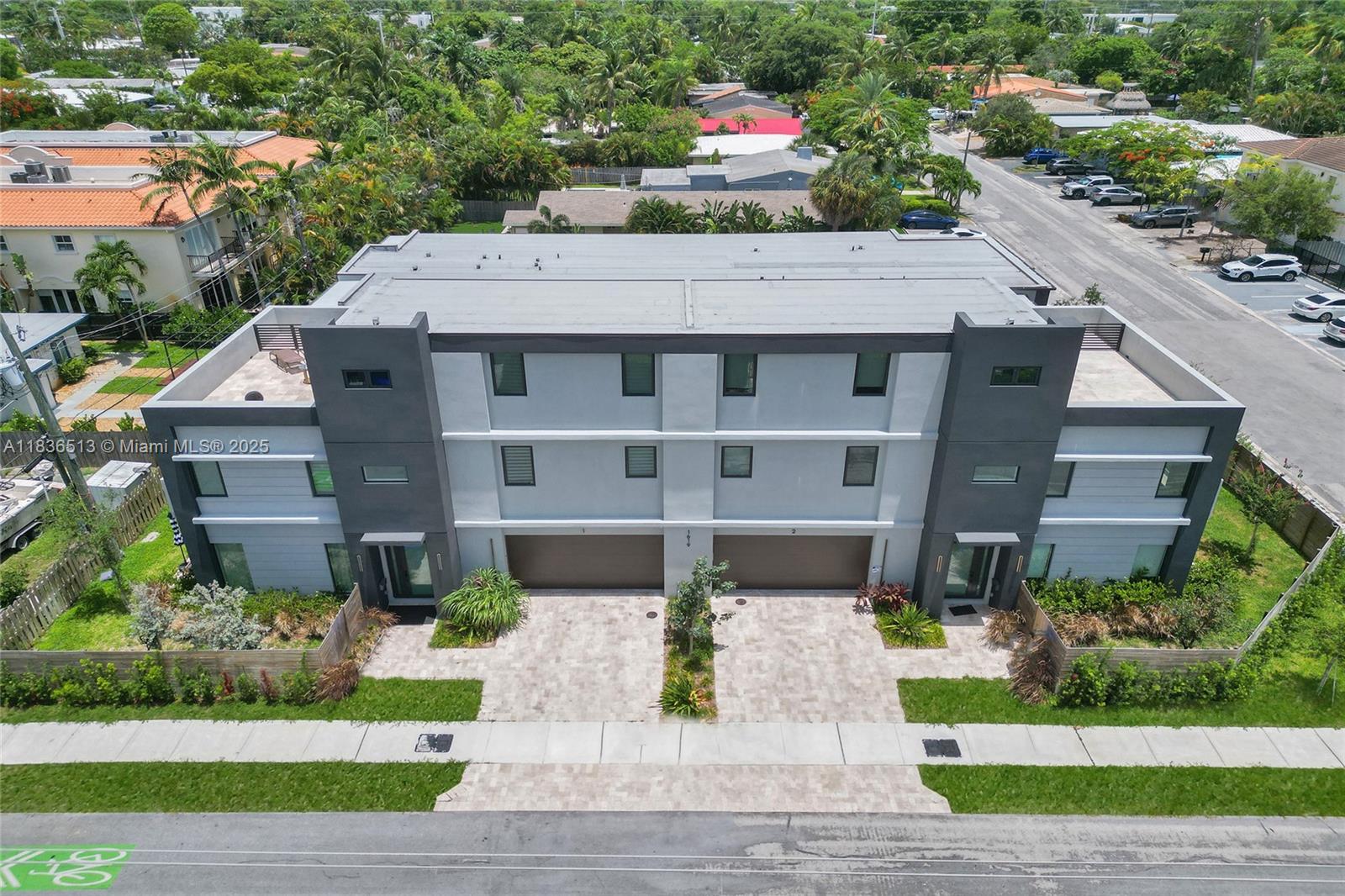Be the first to experience Luxury living in this brand new modern 4BDs & 4.5BA townhome, located minutes from Las Olas Blvd & the Beach. This never-lived- in immaculate Smart Home offers the epitome of contemporary elegance. Thoughtfully designed 3 levels layout with living room flowing into the dining area on the First level, 3 Bedrooms on the Second level including Primary Bedroom with private Balcony. Washer & Dryer is on the Second floor, ensuring effortless living. Oversized terrace on the 3rd level. Sleek, modern appliances and finishes. Ample closet space throughout. Large 2 car Garage with a private driveway. Spacious & fenced in front yard for outdoor enjoyment. The largest townhouse in the area!