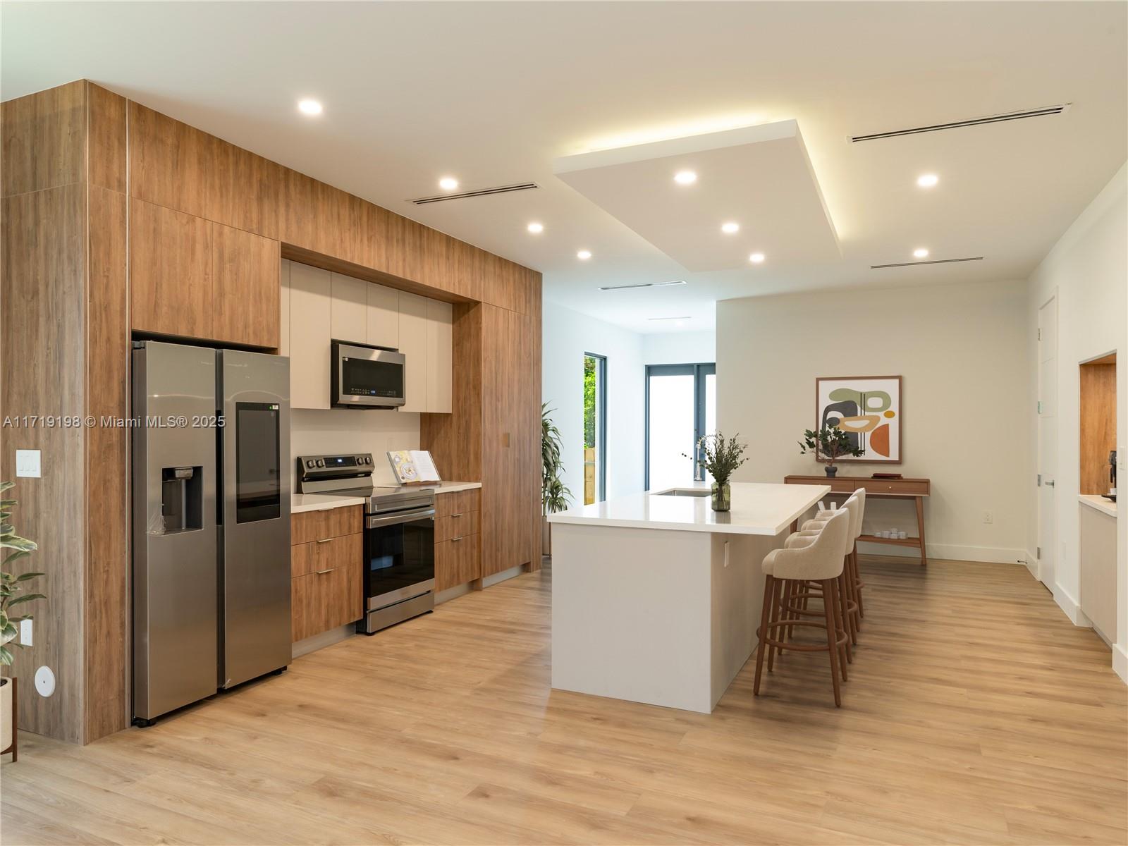 This stunning luxury property in East Fort Lauderdale boasts just under 3,000 square feet. Featuring 4 generously sized bedrooms and 3.5 bathrooms, this home is adorned with high-end finishes throughout. All bedrooms are conveniently located on the second floor, including a primary suite with an expansive walk-in closet. Designed for both comfort and entertaining, the home offers ample storage and a 1-car garage. The fenced-in yard provides privacy and outdoor enjoyment, while its prime location is just a short stroll to the picturesque Snyder Park.
