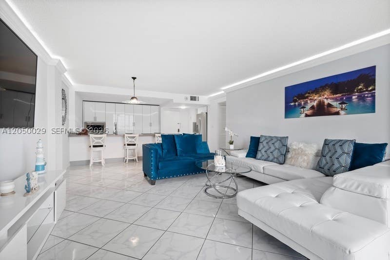 Photo of 3800 S Ocean Dr #410, Hollywood, FL 33019 (MLS # A12050029)