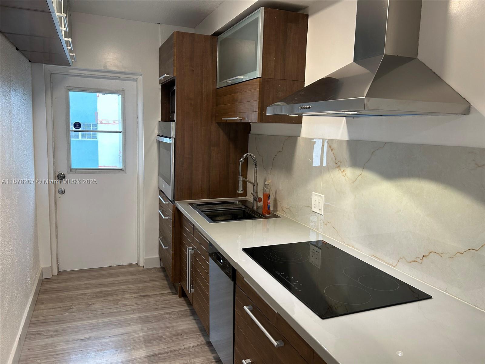 TUDOR HOUSE CONDO - Residential