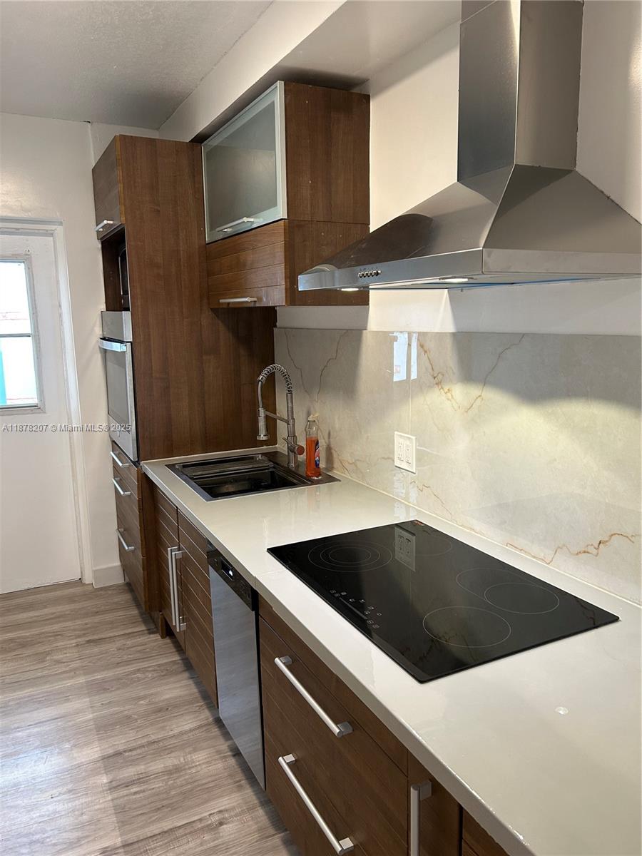 TUDOR HOUSE CONDO - Residential