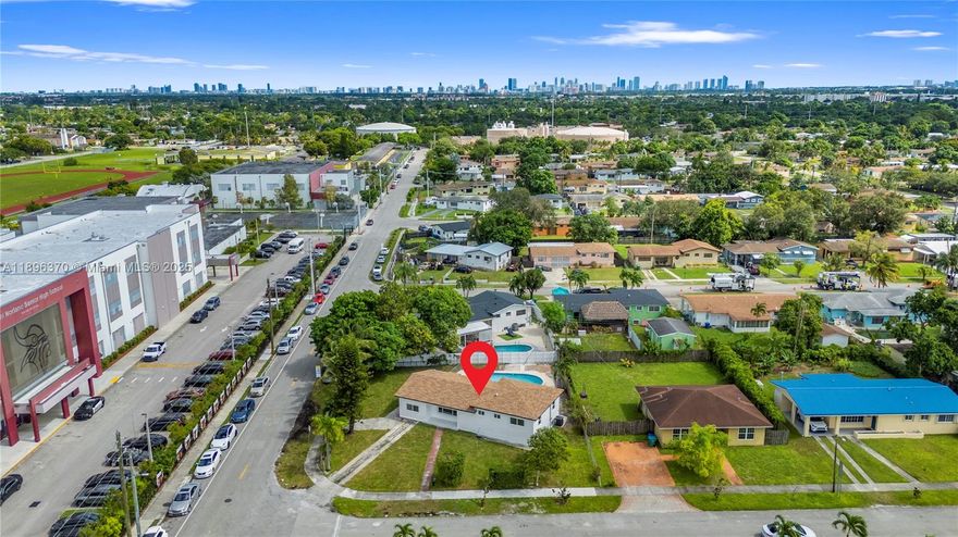 Stunning modern 4-bedroom, 3-bathroom home on a 10,800 sq ft corner lot. This spacious property features a sparkling pool, a lush green backyard, impact windows, and generously sized living areas perfect for entertaining or a growing family. The open-concept layout allows natural light to fill every room, creating a bright and welcoming atmosphere. Ideal for families seeking comfort, style, and outdoor enjoyment in a prime location.