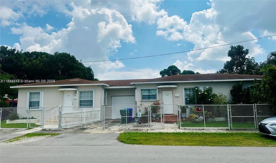 Charming Duplex on a Corner Lot in Prime Location! Each unit features 2 bedrooms and 1 bathroom, with in-unit washer & dryer, central A/C, and tile flooring throughout. The roof was replaced in June 2012, and all windows are equipped with accordion hurricane shutters for peace of mind. One unit offers a fully remodeled bathroom, new kitchen cabinets and appliances, pantry, tankless water heater, all LED lighting, new blinds, and an electrical gate for private rear parking. The property has a land use of 2–9 units, offering possible development into a new building. Additionally, there is a garage located between the two units that could be converted to generate extra income or used to expand one of the units, making this a versatile opportunity for investors or owner-occupants alike.