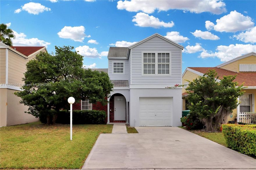 This inviting and well-maintained 2-story home resides within the desirable Deerwood Community, offering a comfortable and convenient lifestyle. The home boasts several key upgrades, including partial impact windows for added security, and a fresh, bright ambiance thanks to a recent paint job. A new A/C unit ensures efficient climate control throughout the year. The first floor features durable and easy-to-clean tile flooring, while the second floor is enhanced with stylish wood-like laminate. Furthermore, its location places residents within minutes of popular destinations such as the Zoo, various shopping centers, an array of restaurants, parks, and the readily accessible Turnpike, providing the perfect blend of suburban tranquility and urban convenience.