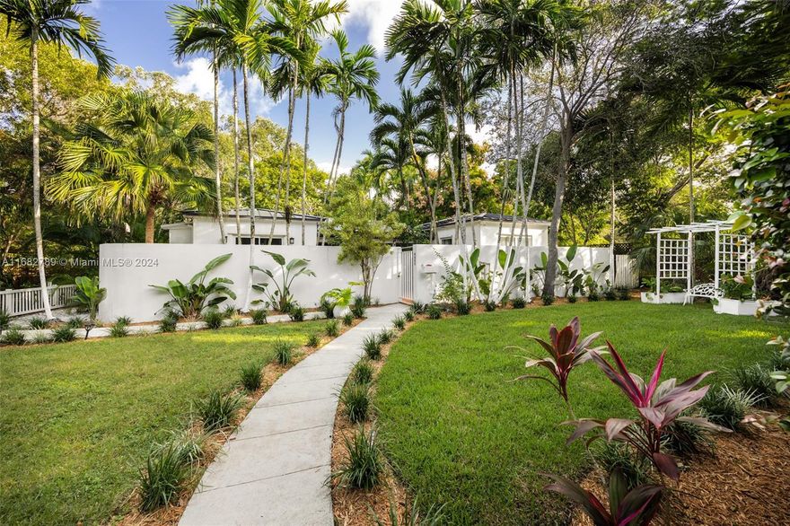 Lovely home secluded behind a tall privacy hedge in prestigious South Coconut Grove. Light-filled living spaces w/ vaulted, wood-beamed ceilings & floor-to-ceiling windows overlooking the lush, tropical garden. Updates include new roof & solar panels, impact windows/doors & renovated baths. Stunning new kitchen has quartz countertops, stainless appliances, cooking island & separate breakfast area. Expansive back yard is a lush oasis w/brick terrace, gazebo, captivating koi pond & ample space to add a pool. Close to shopping, dining & bayfront parks in the historic Grove village and just minutes to downtown, MIA & the Beaches.