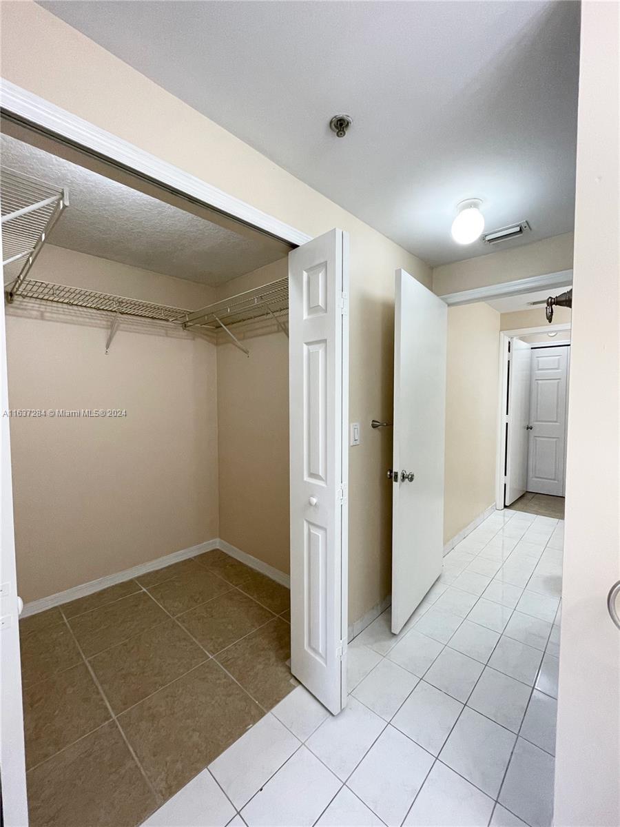 THE COURTS AT DORAL ISLES - Residential Lease