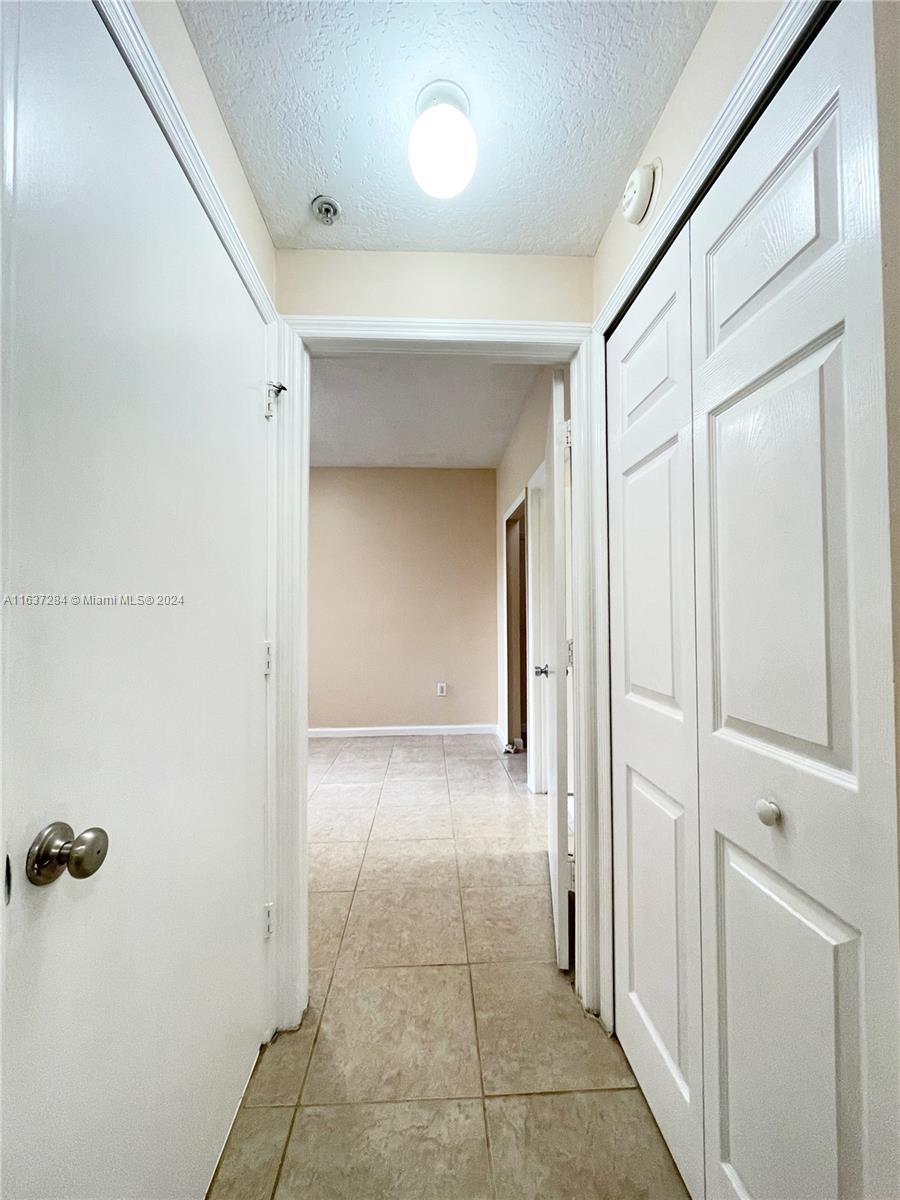 THE COURTS AT DORAL ISLES - Residential Lease
