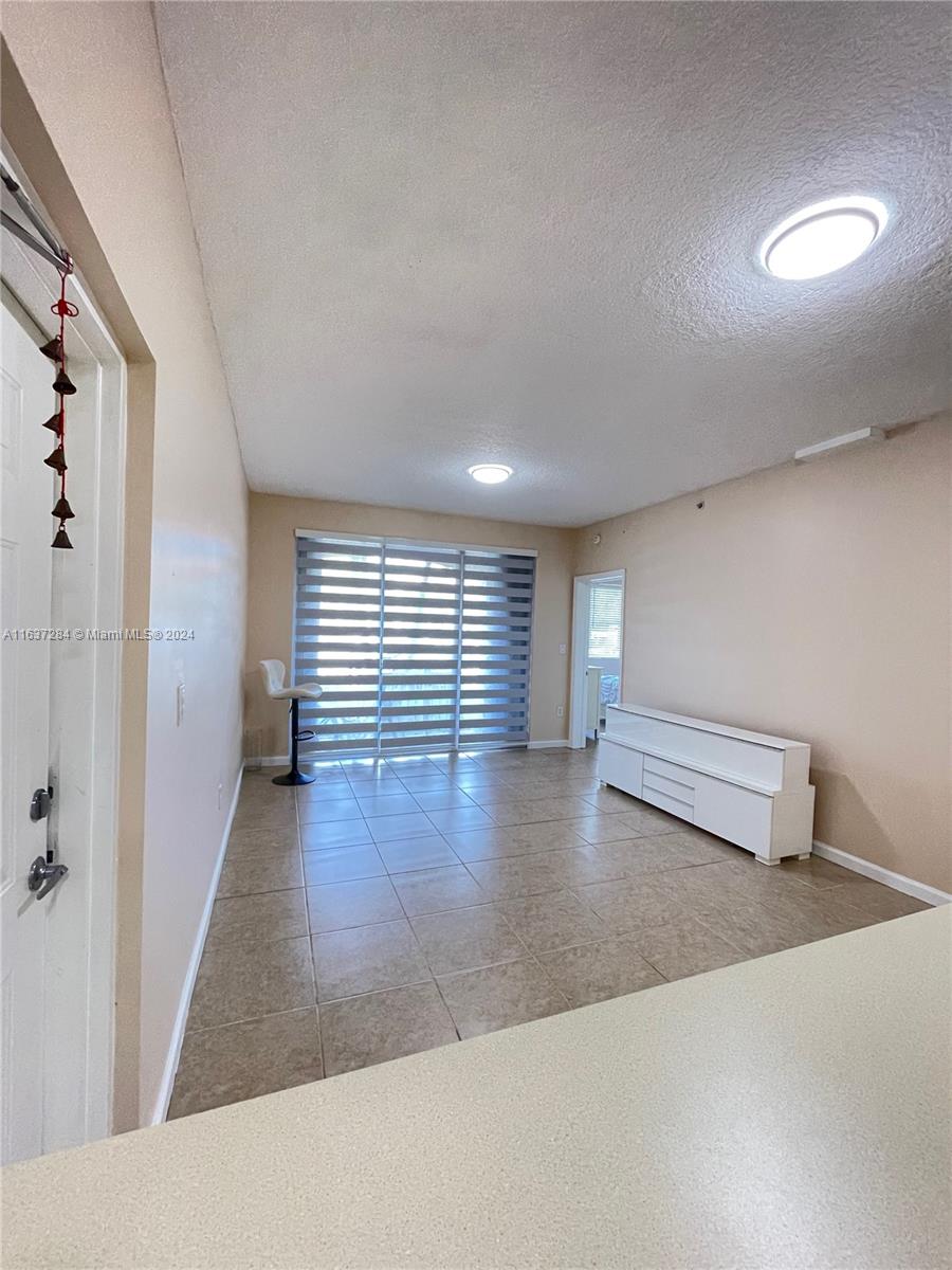 THE COURTS AT DORAL ISLES - Residential Lease