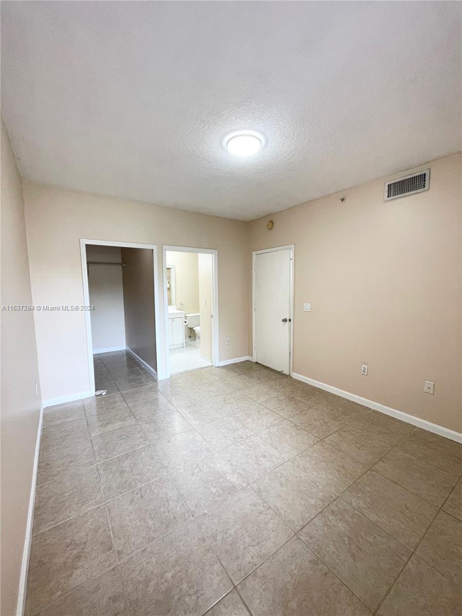 THE COURTS AT DORAL ISLES - Residential Lease