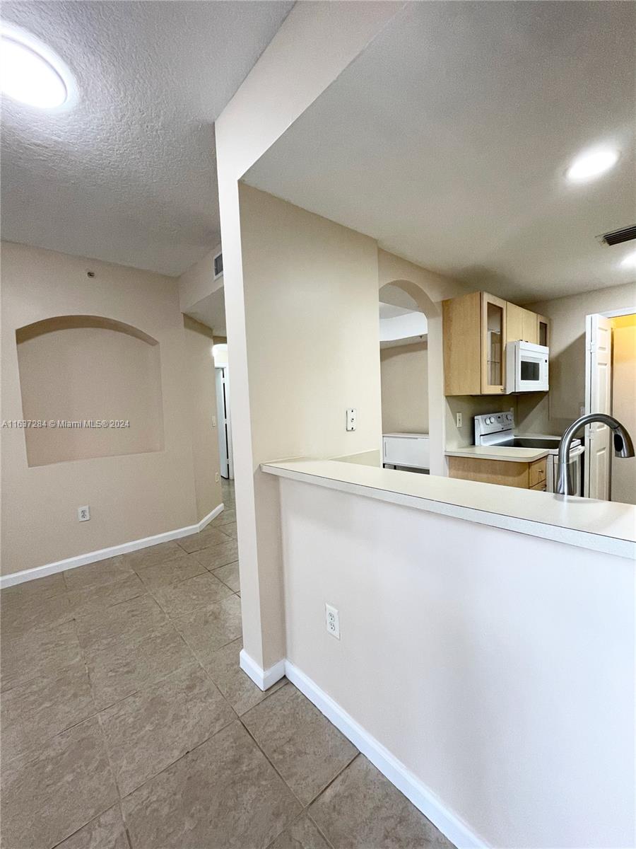 THE COURTS AT DORAL ISLES - Residential Lease
