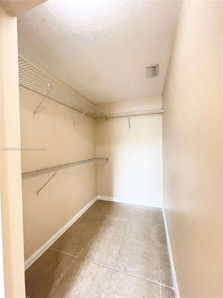 THE COURTS AT DORAL ISLES - Residential Lease