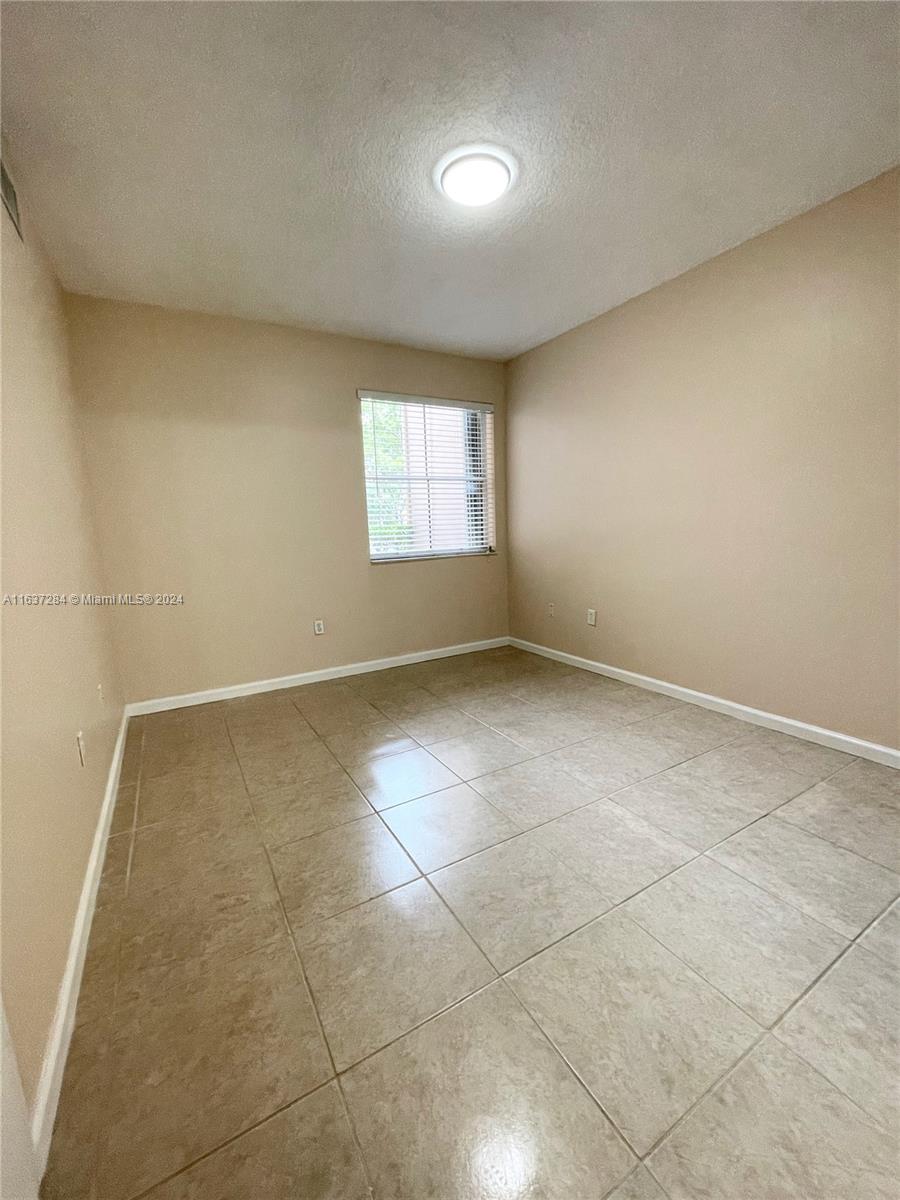 THE COURTS AT DORAL ISLES - Residential Lease