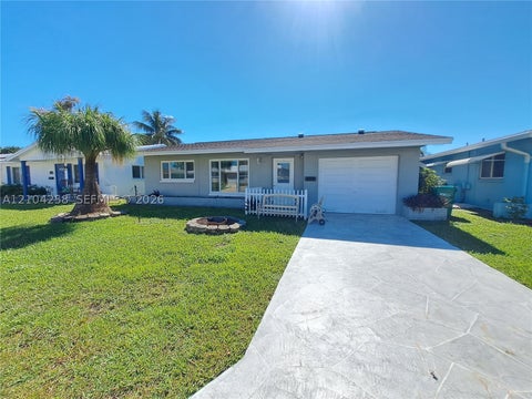 Photo of 5010 NW 51st Ct, Tamarac, FL 33319 (MLS # A12104258)