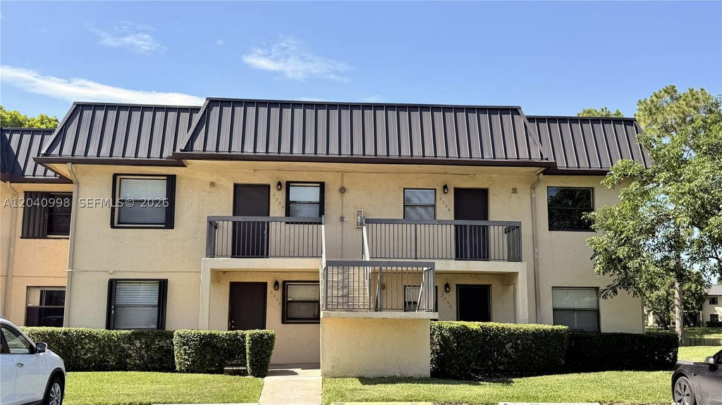 Photo of 9262 NW 1st St #205, Pembroke Pines, FL 33024 (MLS # A12040998)