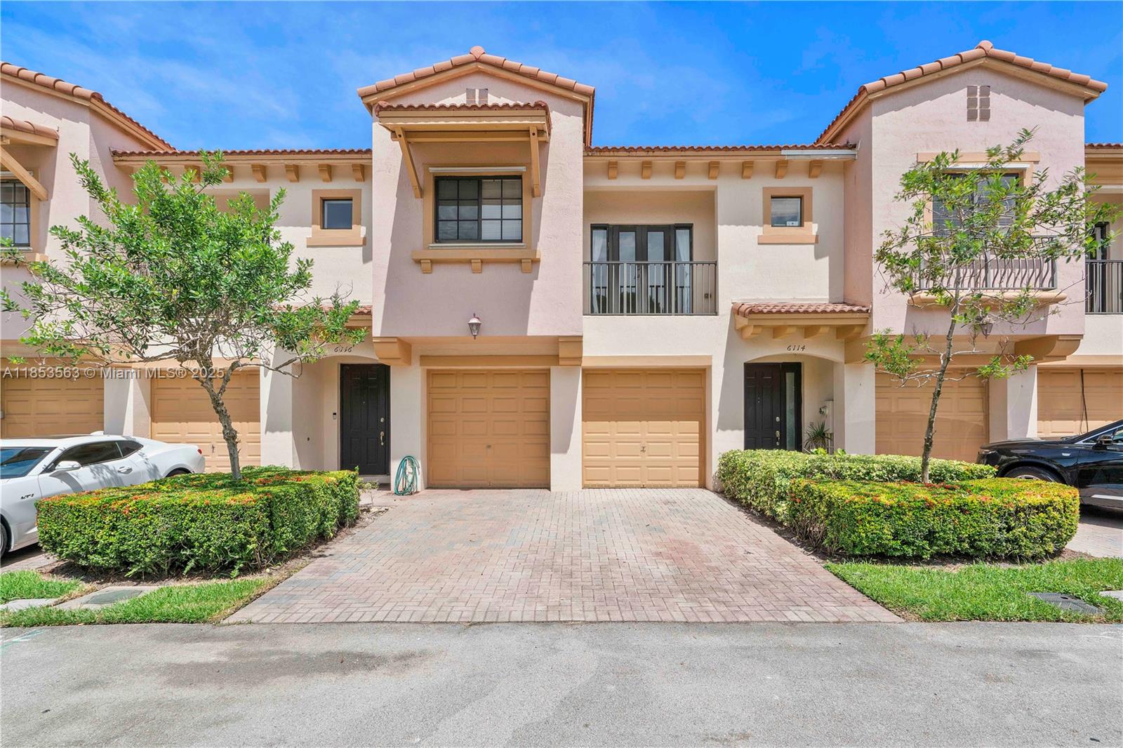 Welcome to this beautiful 3BR, 2.5BA townhome in the desirable Grand Cypress community! This 2-story home offers a 2-car garage, open floor plan, modern kitchen, a spacious primary suite with walk-in closet, and a luxurious bath with separate tub and shower. Water Heater 2025. Refrigerator and Washer 2024. A secondary bedroom features its own private balcony. Enjoy tile and wood-look floors, a paved patio, and peaceful preserve views in the backyard. Community amenities include a pool and walking paths. Just minutes from highways and The Promenade at Coconut Creek’s top dining and shopping. Seller's preferred lender offers a 1% lender credit. A MUST SEE!