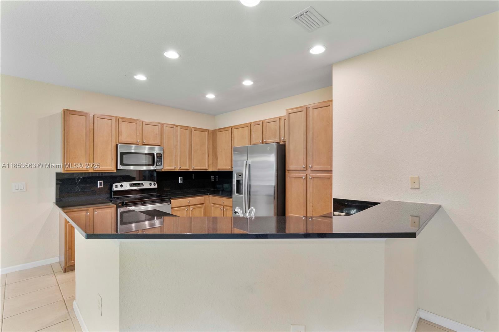 6116 E Grand Cypress Cir E