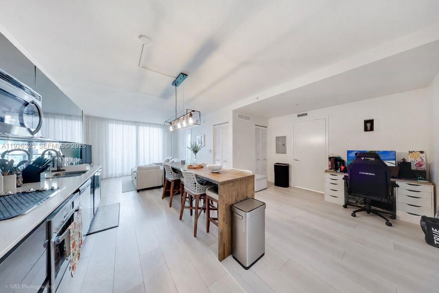 Experience refined living in the heart of Brickell. This beautifully updated 1-bedroom, 1.5-bath residence with a spacious den offers 710 square feet of thoughtfully designed interiors, featuring new flooring, upgraded lighting, and modern finishes throughout. Enjoy open city and river views that capture Miami’s vibrant energy. Ideally located just steps from Brickell’s top restaurants, luxury shopping, cafés, convenience stores, and the Metrorail, this home delivers true walkable urban living. Situated in MyBrickell Condo, a secure boutique building with a state-of-the-art gym and brand-new rooftop pool. Flexible rental options up to 12 times per year make this an excellent opportunity for investors or second-home owners. A peaceful retreat in the center of it all. A 60-day kick-out clause is in place on the current lease.