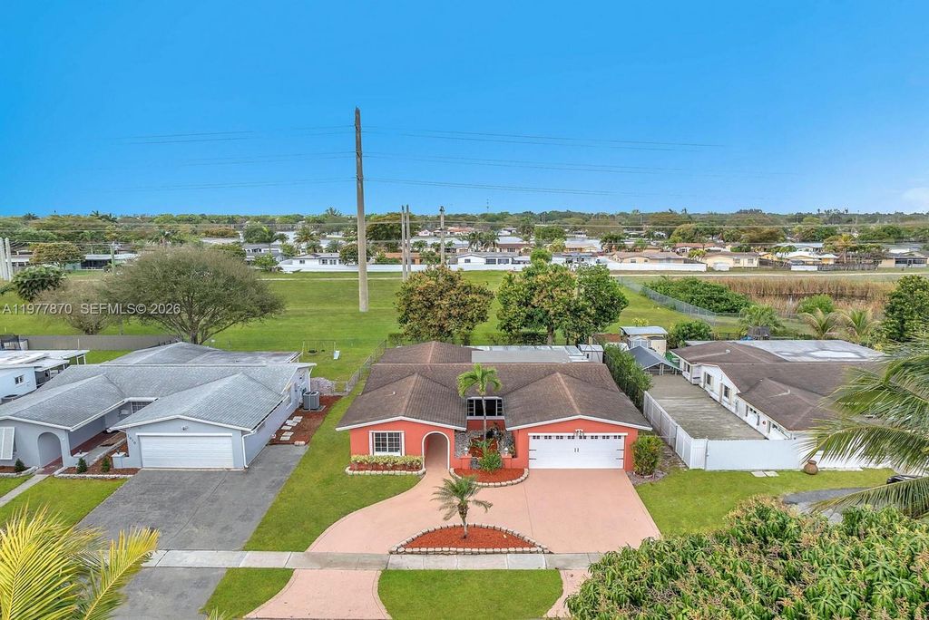 Photo of 2030 NW 91st Ter, Pembroke Pines, FL 33024 (MLS # A11977870)