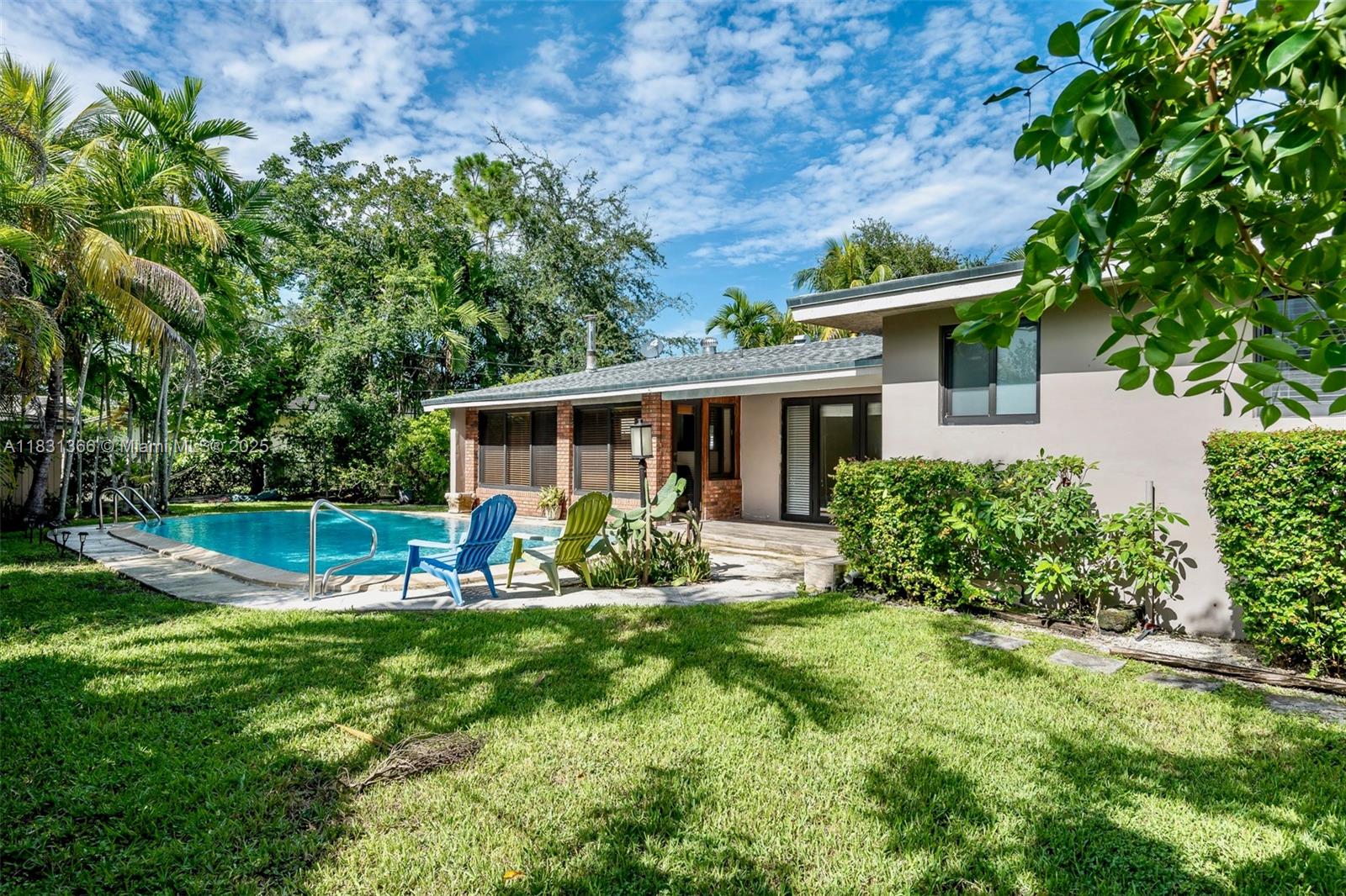 Beautiful 4-bedroom, 2-bath Mid-Century Modern pool home on a quiet street near Continental Park. Features include an open layout, terrazzo floors, remodeled kitchen with quartz counters and new appliances, updated bathrooms, impact windows, alarm system, security cameras, and new roof. Walking distance to Kenwood Elementary and minutes from Baptist Hospital, Dadeland Mall, and Palmetto Expressway. Monthly professional pool service included.