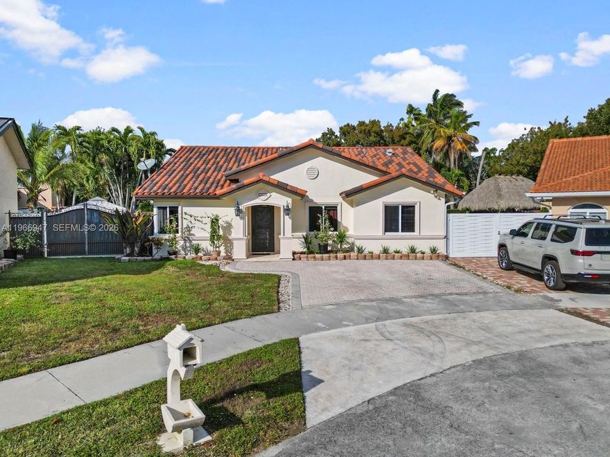 MOTIVATED SELLER! This well-maintained 4BR/2BA single-family home offers space, upgrades like impact windows and doors, and renovated roof. Spacious layout with tile floors in main areas and wood flooring in bedrooms. Updated kitchen with wood cabinetry, granite countertops, and stainless-steel appliances, plus seller credit toward a modern kitchen—add instant equity and customize to taste. Large primary suite with remodeled bath. All bathrooms feature showers. Impact windows and doors throughout. Roof replaced 5 years ago and newer A/C. Recently paved backyard with private new fence and double side gates—perfect for storing a boat or extra vehicles. Paved driveway with ample parking. Prime location near major highways, shopping, dining, and schools.