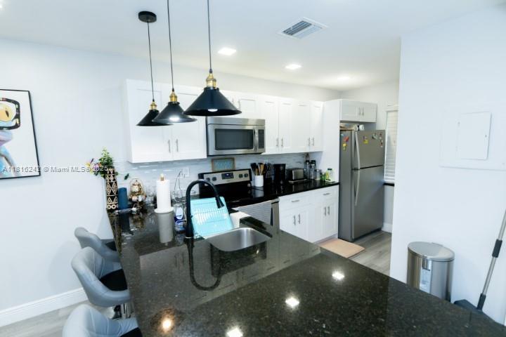 SHERWOOD GARDENS CONDO - Residential Lease