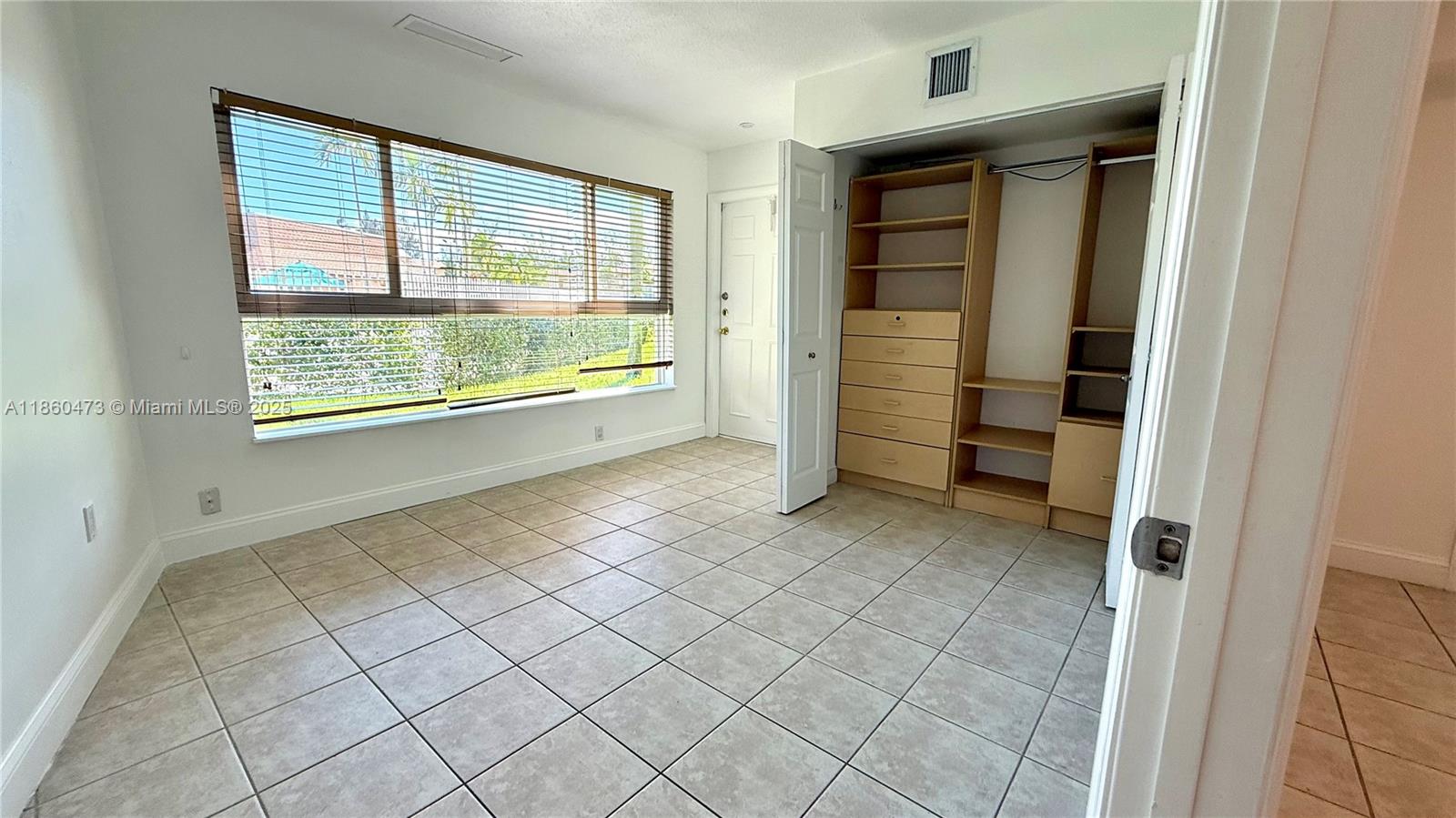 Charming 2-Bed, 1-Bath Home Steps from Miami Lakes Golf Club!
Enjoy this cozy residence featuring living-dining room, 1 bed and one converted bed (2)fully equipped kitchen with brand-new stainless steel appliances (microwave, refrigerator, electric range & oven), plus washer and dryer. The home offers a spacious walk-in closet, impact windows, and a private porch that opens directly to the garden and pool area.THE ASSOCIATION ONLY ACCEPT 3 RESIDENTS.
Conveniently located just in Miami Lakes Main Street, top schools, plazas, renowned restaurants, Cypress Village Shopping Center, Royal Oaks Park, and Baptist Hospital. Easy access to 826. 1ST MONTH RENT AND 1 MONTH SECURITY DEPOSIT !!