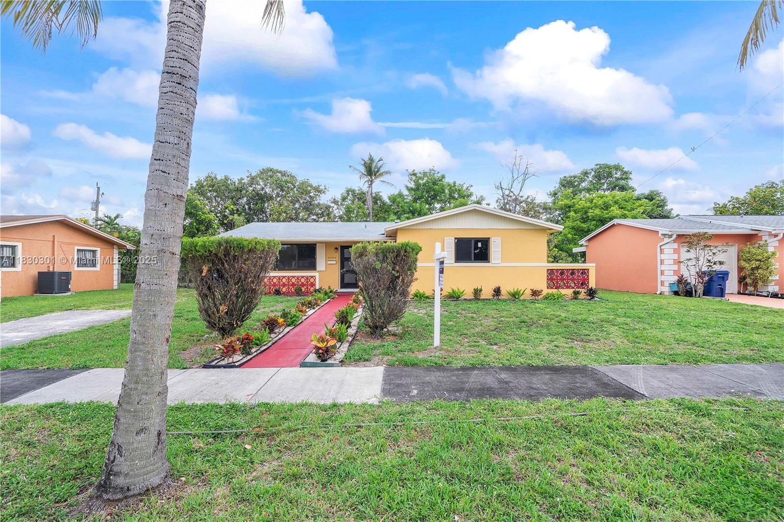 Welcome to this cozy home in the heart of Miami Gardens, located right across from a beautiful park. This home features stunning upgrades, including brand-new impact doors and windows, renovated bathrooms, and a modern kitchen, everything you could want. Enjoy breakfast in your own backyard filled with fruit trees. Priced perfectly, this opportunity won’t last long. Schedule your showing today!
PLEASE TAKE NOTE: THERE IS NO HOA OR ASSOCIATION.