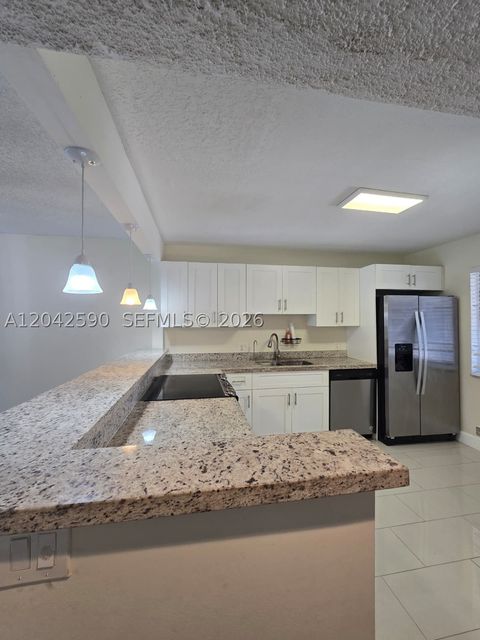 Tiny photo for 16581 Blatt Blvd #104, Weston, FL 33326 (MLS # A12042590)
