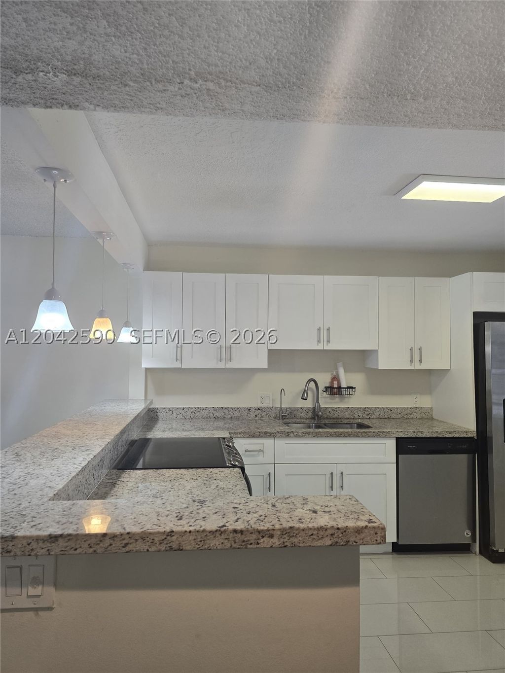 Photo of 16581 Blatt Blvd #104, Weston, FL 33326 (MLS # A12042590)
